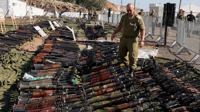 Weapons and other equipment, which the Israeli army says belonged to Hezbollah, are displayed for the media on Dec. 23, 2024, in a northern Israeli military base. A ceasefire had been reached a month earlier, but Israel has accused the militant group of violating its terms.