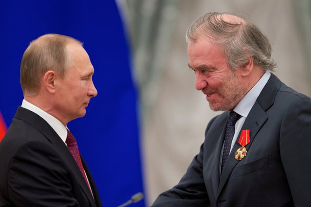 Russian President Vladimir Putin (L) awards Mariinsky Theatre's Artistic Director Valery Gergiev during a ceremony at the Kremlin in Moscow, Russia, September 22, 2016. REUTERS/Ivan Sekretarev/Pool/File Photo