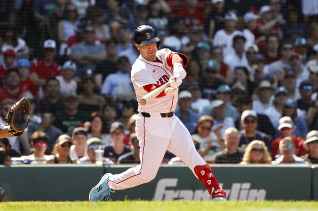BOSTON, MA - JULY 13: Alex Bregman #2 of the Boston Red Sox connects on a hit during the eighth inning against the Tampa Bay Rays at Fenway Park on July 13, 2025 in Boston, Massachusetts.