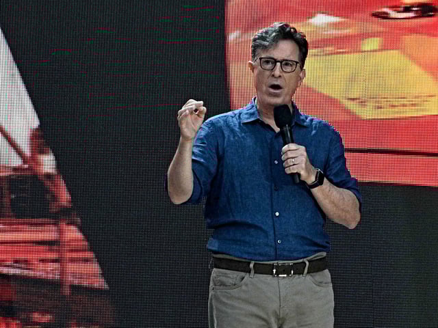NEW YORK, NEW YORK - AUGUST 21: Stephen Colbert speaks at the We Love NYC: The Homecoming Concert at the Great Lawn in Central Park on August 21, 2021 in New York City. We Love NYC: The Homecoming Concert is the culmination star studded performance from NYC Homecoming week which celebrates the city's recovery of the Covid-19 pandemic. (Photo by Alexi Rosenfeld/Getty Images)