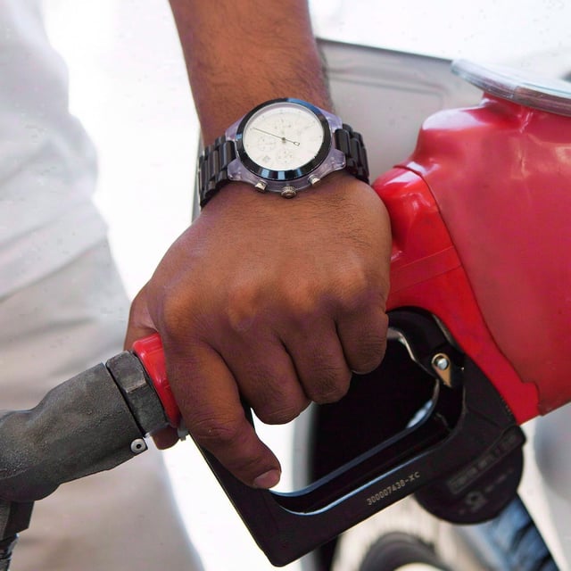 Statistics Canada is set to release June inflation figures on Tuesday. A person pumps fuel in Toronto, on Wednesday, September 12, 2012. THE CANADIAN PRESS/Michelle Siu
