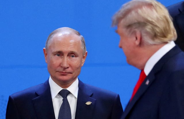 U.S. President Donald Trump and Russia's President Vladimir Putin are seen during the G20 leaders summit in Buenos Aires, Argentina November 30, 2018. REUTERS/Marcos Brindicci/File Photo
