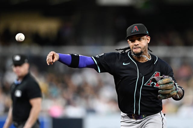 Arizona Diamondbacks second baseman Ketel Marte (4) throws San Diego Padres left fielder Gavin Sheets (30) out at first base during the fifth inning at Petco Park in San Diego, on July 8, 2025.