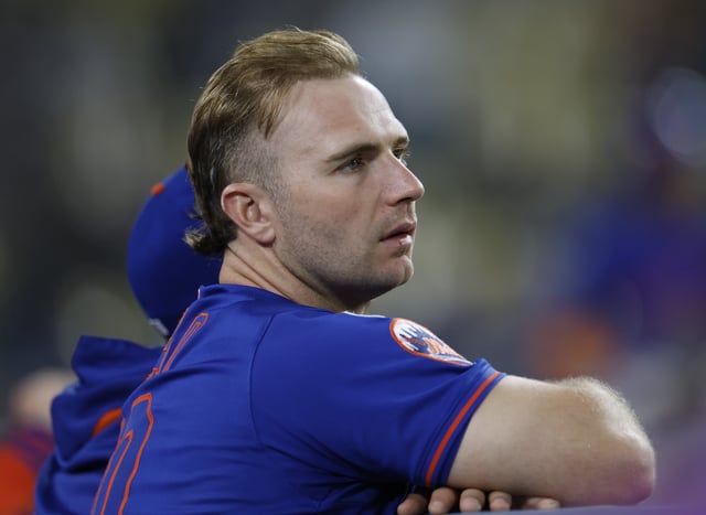 LOS ANGELES, CALIFORNIA - JUNE 04: Pete Alonso #20 of the New York Mets looks out from the dugout during the eighth inning against the Los Angeles Dodgers at Dodger Stadium on June 04, 2025 in Los Angeles, California. (Photo by Harry How/Getty Images)