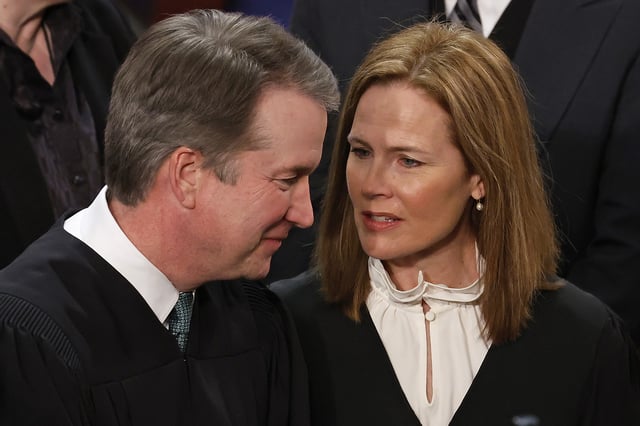 U.S. Supreme Court Justices Brett Kavanaugh and Amy Coney Barrett talk before President Joe Biden delivers the State of the Union address to a joint session of Congress in the House Chamber at the U.S. Capitol on February 7, 2023 in Washington, D.C.