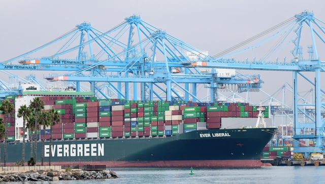 In this Oct. 6, 2021, file photo, the Evergreen cargo ship “Ever Liberal” filled with containers is seen at the Port of Los Angeles in San Pedro, California.