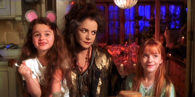 Evan Rachel Wood is smiling in Practical Magic.
