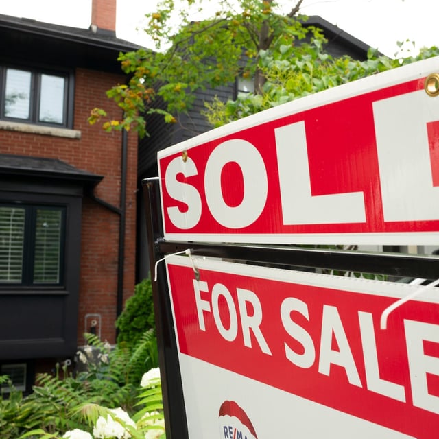 The Toronto Regional Real Estate Board says 6,244 homes were sold in May, down 13.3 per cent year-over-year. A west-end Toronto home for sale is shown in a July 15, 2023 file photo. THE CANADIAN PRESS/Graeme Roy