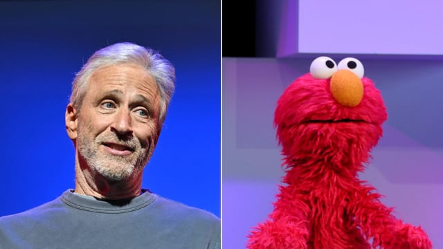 (L-R:) Jon Stewart, Elmo