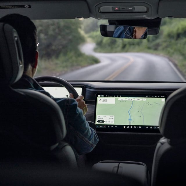 Navigating a Rivian car with Google Maps.