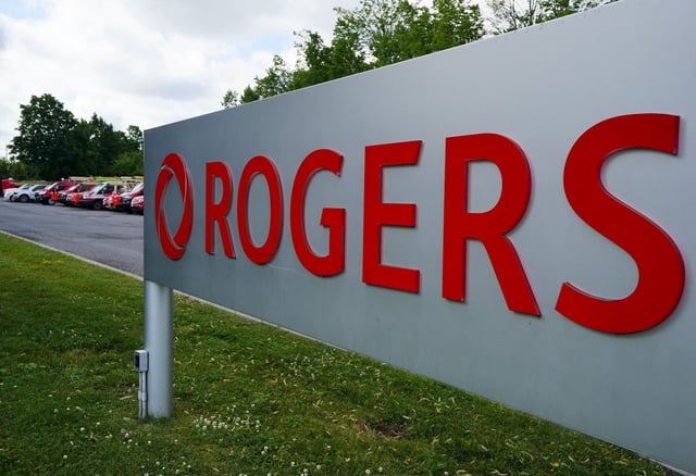Rogers Communications signage is pictured in Ottawa on Tuesday, July 12, 2022. Rogers Communications Inc. has launched a new satellite-to-mobile text messaging service, marking the latest step in its partnership with SpaceX and Lynk Global to eventually deliver full satellite-to-phone coverage across apps, data and voice service. THE CANADIAN PRESS/Sean Kilpatrick