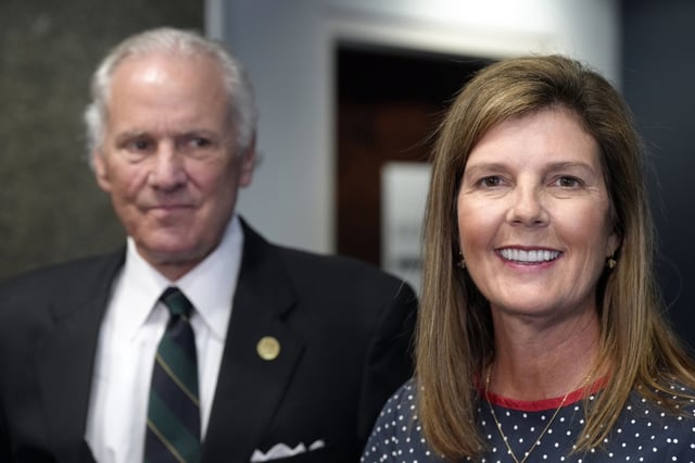 FILE - South Carolina Gov. Henry McMaster, left, looks on as South Carolina Lt. Gov. Pamela Evette, right, speaks with reporters, July 27, 2022, in Columbia, S.C. (AP Photo/Meg Kinnard, File)