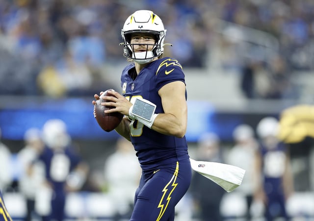Justin Herbert #10 of the Los Angeles Chargers looks to throw a pass against the Baltimore Ravens during the first quarter in the game at SoFi Stadium on November 25, 2024 in Inglewood, California.