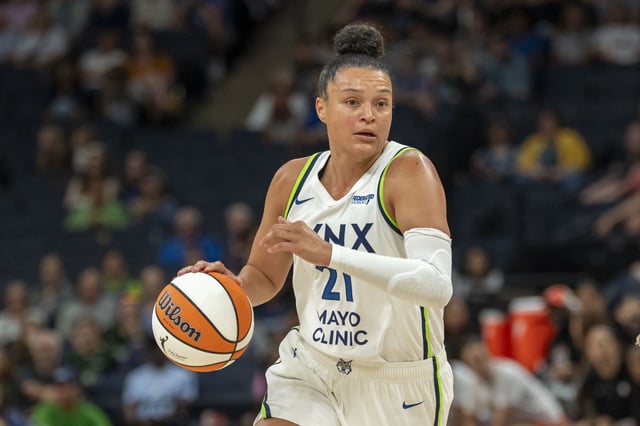 Jun 29, 2025; Minneapolis, Minnesota, USA; Minnesota Lynx guard Kayla McBride (21) dribbles the ball against the Connecticut Sun in the first half at Target Center. Mandatory Credit: Jesse Johnson-Imagn Images/File Photo