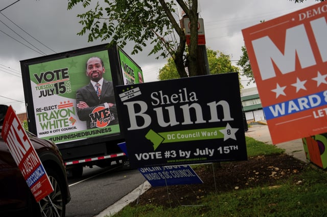 A mobile billboard truck displays a message in support of former District of Columbia Councilman Trayon White outside the Anacostia Neighborhood Library during the Ward 8 special election, Tuesday, July 15, 2025, in Washington. (AP Photo/Julia Demaree Nikhinson)