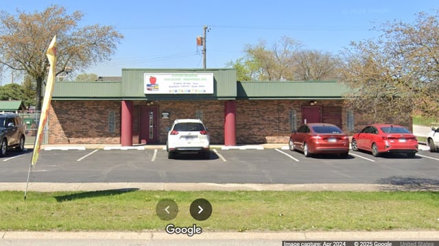 A teacher at a Gary, Indiana, day care is accused of abusing children while on video calls with a jail inmate, officials say.