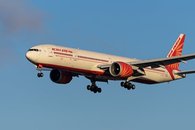 An Air India Boeing 777-300ER jet (VT-ALQ) airborne on final approach for landing at Vancouver International Airport, Richmond, B.C., on Wednesday, November 9, 2022. 