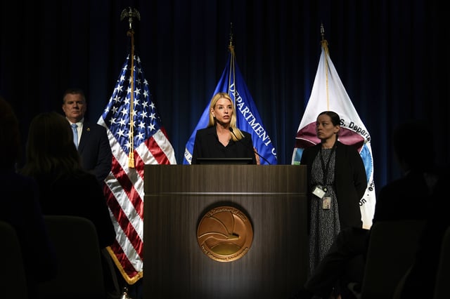 Attorney General Pam Bondi, center, speaks at a news conference at the Drug Enforcement Administration, Tuesday, July 15, 2025, in Arlington, Va. (AP Photo/Julia Demaree Nikhinson)