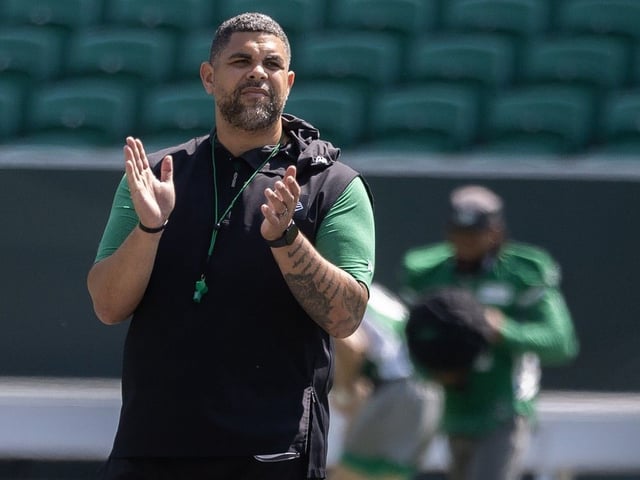 Saskatchewan Roughriders head coach Corey Mace watches practice at Mosaic Stadium.