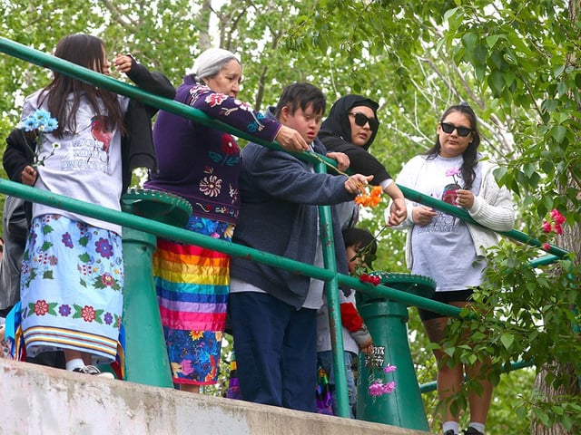  Lena Wildman, Levon Fox Wildman’s mother, along with family and friends set up a memorial on Memorial Drive under the 4th Avenue flyover and threw flowers into the Bow River in Calgary on Wednesday, May 29, 2024. Levon was shot and killed by police one year ago today.