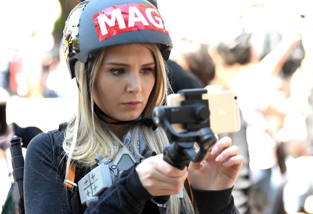 Canadian conservative and libertarian activist Lauren Southern live streams a video during a rally in Berkeley, California on April 27, 2017. (JOSH EDELSON/AFP via Getty Images)