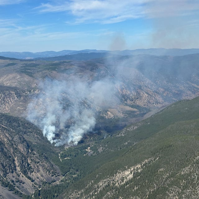 A wildfire, seen in this handout photo, burning near Keremeos, B.C., on Friday, July 11, 2025, THE CANADIAN PRESS/Handout — BC Wildfire Service (Mandatory Credit)