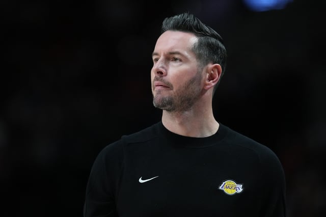 Head coach JJ Redick of the Los Angeles Lakers watches from the sideline during the first half against the Portland Trail Blazers at Moda Center on April 13, 2025 in Portland, Oregon.