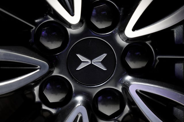 The logo of XPeng is seen on media day at the 2024 Paris Auto Show in Paris, France, October 14, 2024. REUTERS/Benoit Tessier/File Photo