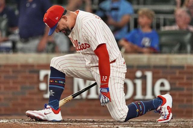 Philadelphia Phillies Kyle Schwarber celebrates after winning the tiebreaker at the MLB baseball All-Star game between the American League and National League.