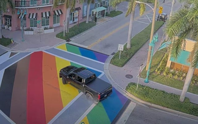 Delray Beach Police are trying to identify the driver shown in surveillance video on June 17, 2025, burning truck tires on the city&#39;s LGTBQ Pride intersection at Northeast First Street and Northeast Second  Avenue. (Delray Beach Police/Courtesy)