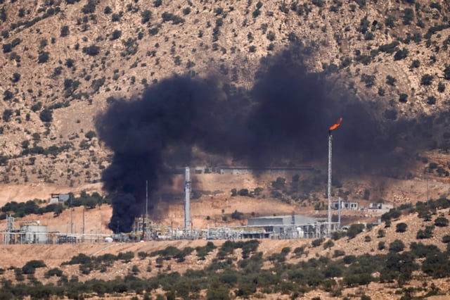 Smoke rises above an oil field following a drone attack, on the outskirts of Zakho city in the Kurdistan Region of Iraq on July 16.
