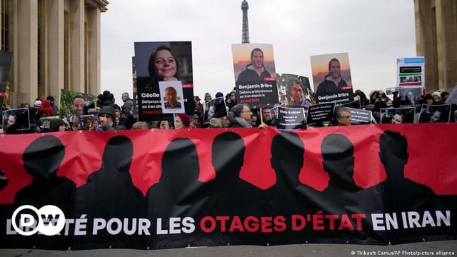 Protesters in France calling for the release of French nationals held in Iran