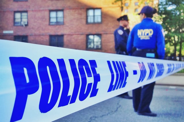 Police tape is hung up at a crime scene in New York City on May 18, 2014.