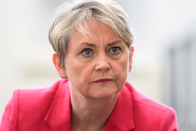 LIVERPOOL, ENGLAND - SEPTEMBER 21: Home Secretary Yvette Cooper speaks with members of the local community during a visit to the recently refurbished Spellow library on September 21, 2024 in Liverpool, England. Leon Neal/Pool via REUTERS/File Photo