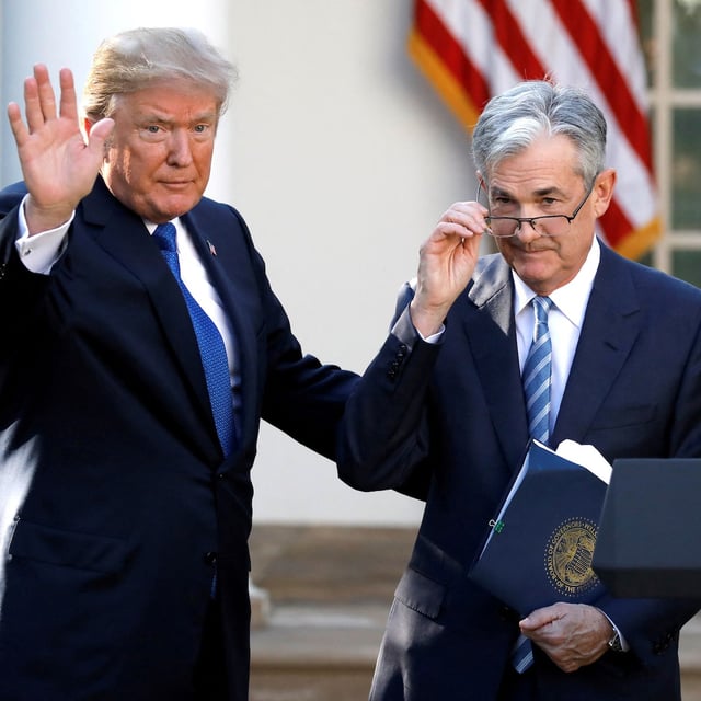 FILE PHOTO: U.S. President Donald Trump gestures with Jerome Powell, his nominee to become chairman of the U.S. Federal Reserve at the White House in Washington, U.S., November 2, 2017. REUTERS/Carlos Barria/File Photo