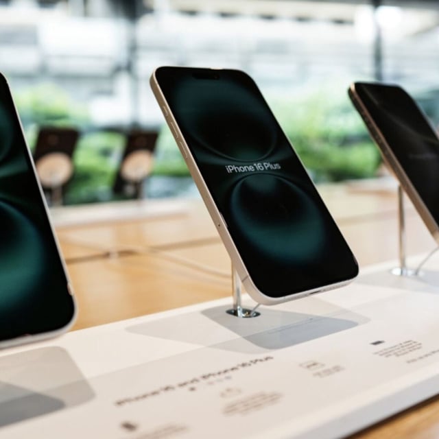 iPhones on display at an Apple store.