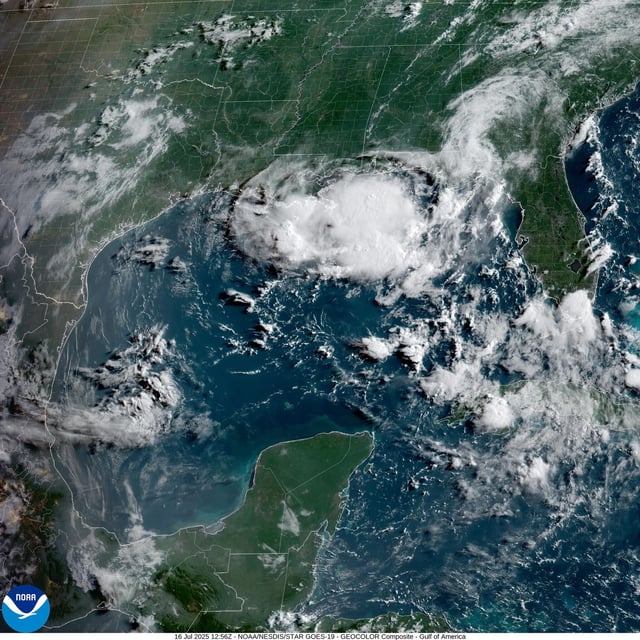 Invest 93L is just to the right of a cluster of clouds seen here in a weather satellite photo of the Gulf of Mexico taken Wednesday morning. The center of circulation of the tropical disturbance was in the Florida Panhandle early Wednesday, but the heaviest rainfall associated with Invest 93L is far removed from its center.