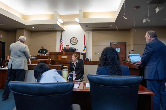 Public defender Peter Mills and prosecutor Jack Campbell appear before Second Judicial Circuit Judge Lance Neff during a case management conference in Tallahassee, Fla. on Wednesday, July 16, 2025 in the case of Phoenix Ikner, a Florida State University student accused of carrying out a mass shooting on campus. (Alicia Devine/Tallahassee Democrat via AP, Pool)