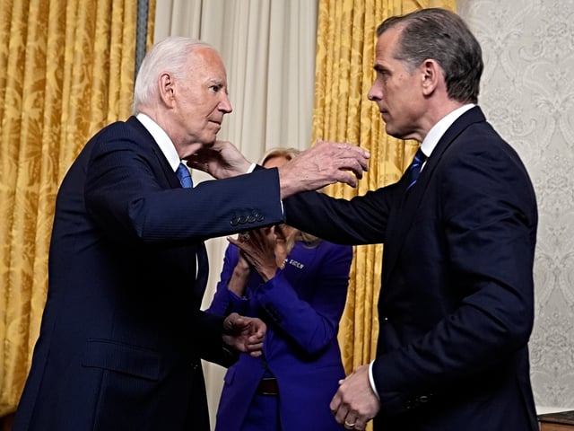 WASHINGTON, DC - JULY 24: U.S. President Joe Biden hugs son Hunter Biden after addressing the nation from the Oval Office of the White House on July 24, 2024 in Washington, DC. The president addressed reasons for abruptly ending his run for a second term after initially rejecting calls from some top Democrats to do so, and outlined what he hopes to accomplish in his remaining months in office. (Photo by Evan Vucci-Pool/Getty Images)