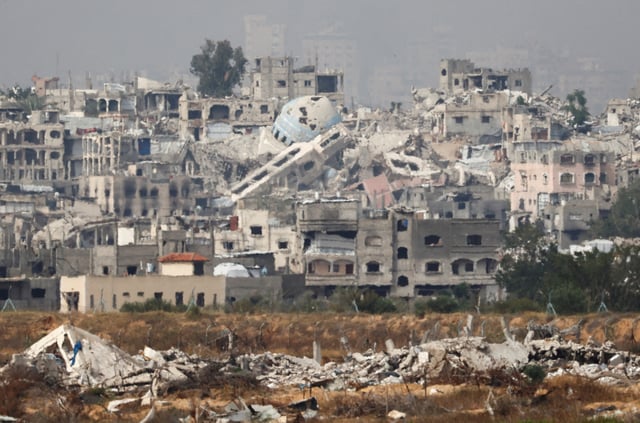 A general view of destruction in North Gaza, as seen from the Israeli side of the Israel-Gaza border, May 17, 2025. REUTERS/Amir Cohen/File Photo