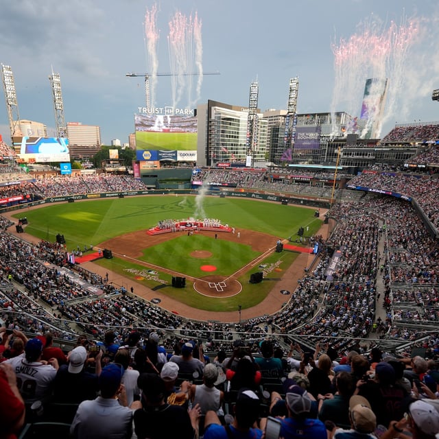 Teams pose before the MLB baseball All-Star game between the American League and National League, Tuesday, July 15, 2025, in Atlanta. (AP Photo/Mike Stewart)
