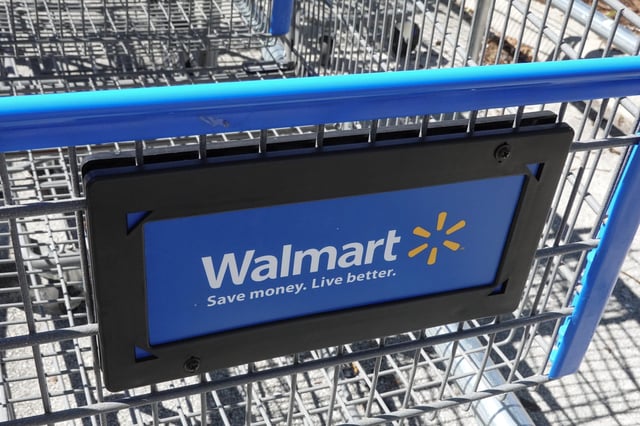 A Walmart Supercenter cart sits outside of the store on February 20, 2024, in Hallandale Beach, Florida.