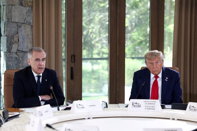 U.S. President Donald Trump and Canadian Prime Minister Mark Carney attend a meeting with G7 leaders and guests, at the G7 summit in Kananaskis, Alberta, Canada,  June 16, 2025.  REUTERS/Kevin Lamarque/File Photo