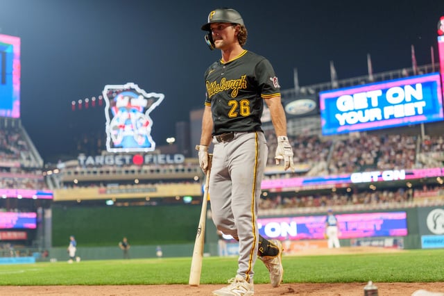 Jul 11, 2025; Minneapolis, Minnesota, USA; Pittsburgh Pirates second base Adam Frazier (26) strikes out against Minnesota Twins pitcher Jhoan Duran (59) in the ninth inning at Target Field. Mandatory Credit: Matt Blewett-Imagn Images/File photo