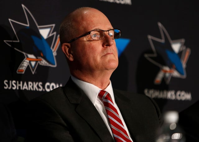 San Jose Sharks assistant general manager Wayne Thomas listens during a press conference announcing the retirement of goaltender Evgeni Nabokov at the SAP Pavilion in San Jose, Calif., on Wednesday, Feb. 11, 2015.  (Nhat V. Meyer/Bay Area News Group)