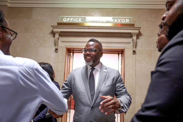 Mayor Brandon Johnson greets people after promising to veto the teen curfew on July 16, 2025, at a press conference at City Hall. (Antonio Perez/Chicago Tribune)