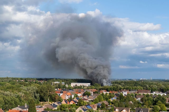 Smoke billows above the site of the Tomorrowland electronic music festival in Boom, northern Belgium on July 16.