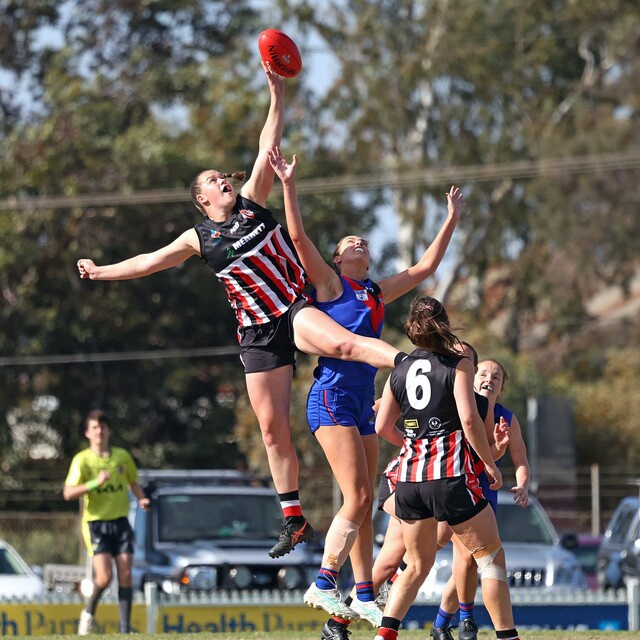 Jedah Huf flies high in a ruck contest with Eastern's Alex Pearce.