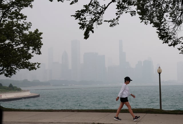 The Chicago skyline is blanketed in haze from Canadian wildfires seen from Solidarity Drive on June 27, 2023, as weather officials issued an air quality alert. (Antonio Perez/Chicago Tribune/Tribune News Service via Getty Images)