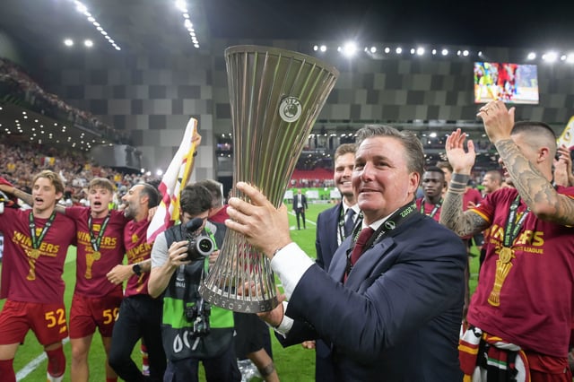 AS Roma President Dan Friedkin poses with trophy after the UEFA Conference League final match between AS Roma and Feyenoord at Arena Kombetare on May 25, 2022, in Tirana, Albania. Friedkin has formed a compay to oversee his international soccer holdings.